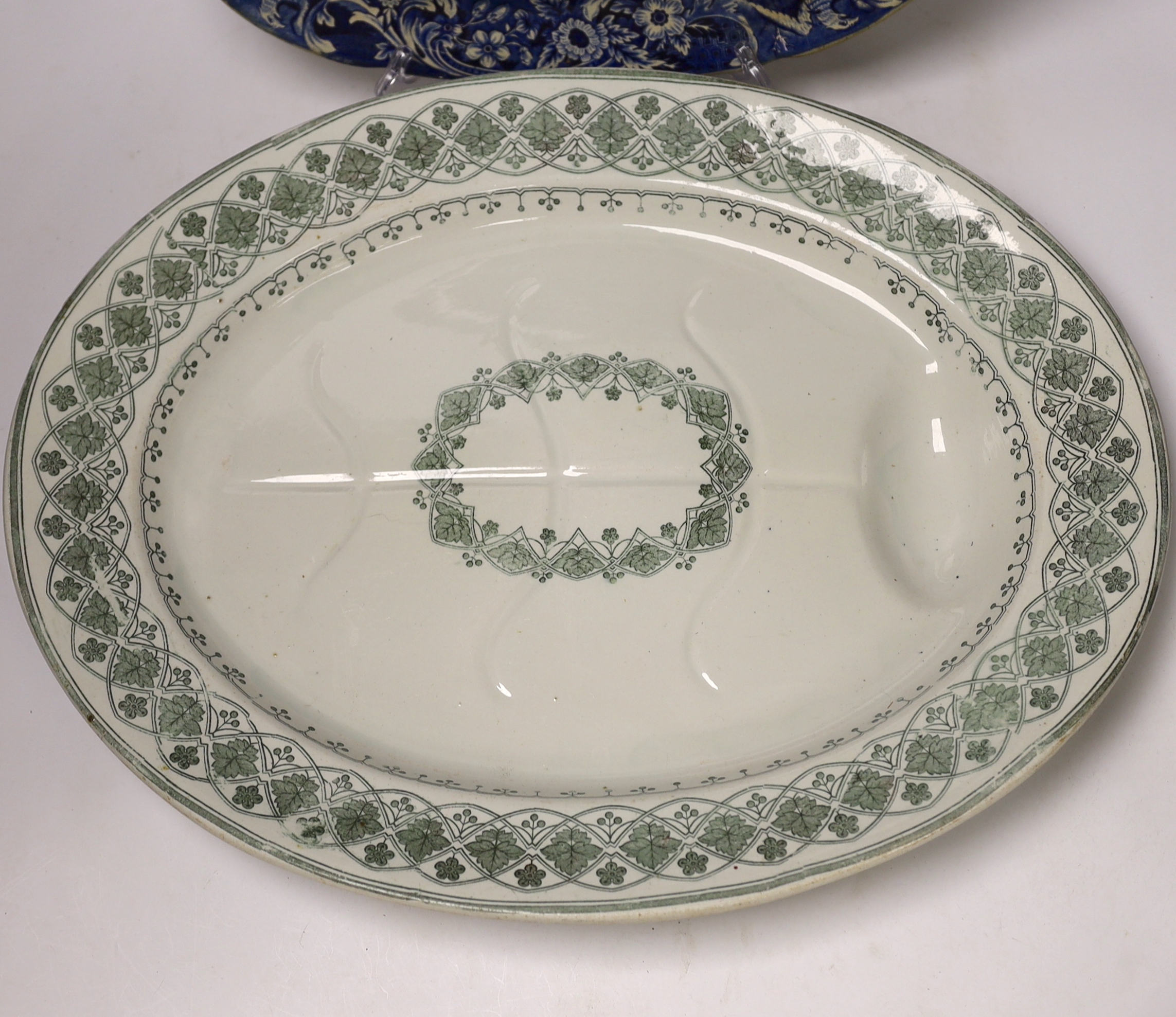 A Davenport meat dish, another and two jugs, largest 53cm